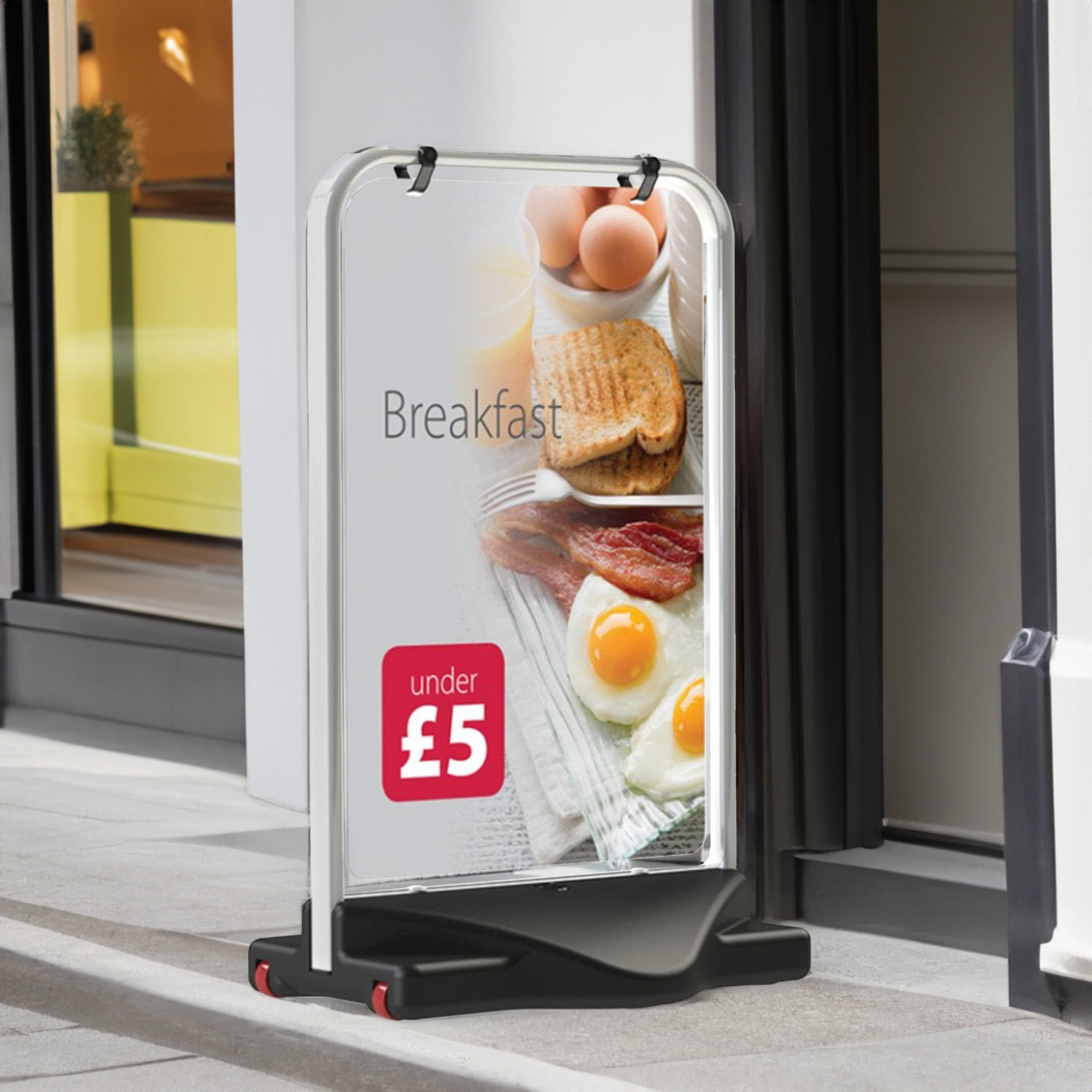 A sturdy A1 white swing pavement sign with a durable water-filled base, featuring a double-sided display for high-impact outdoor advertising and promotions.
