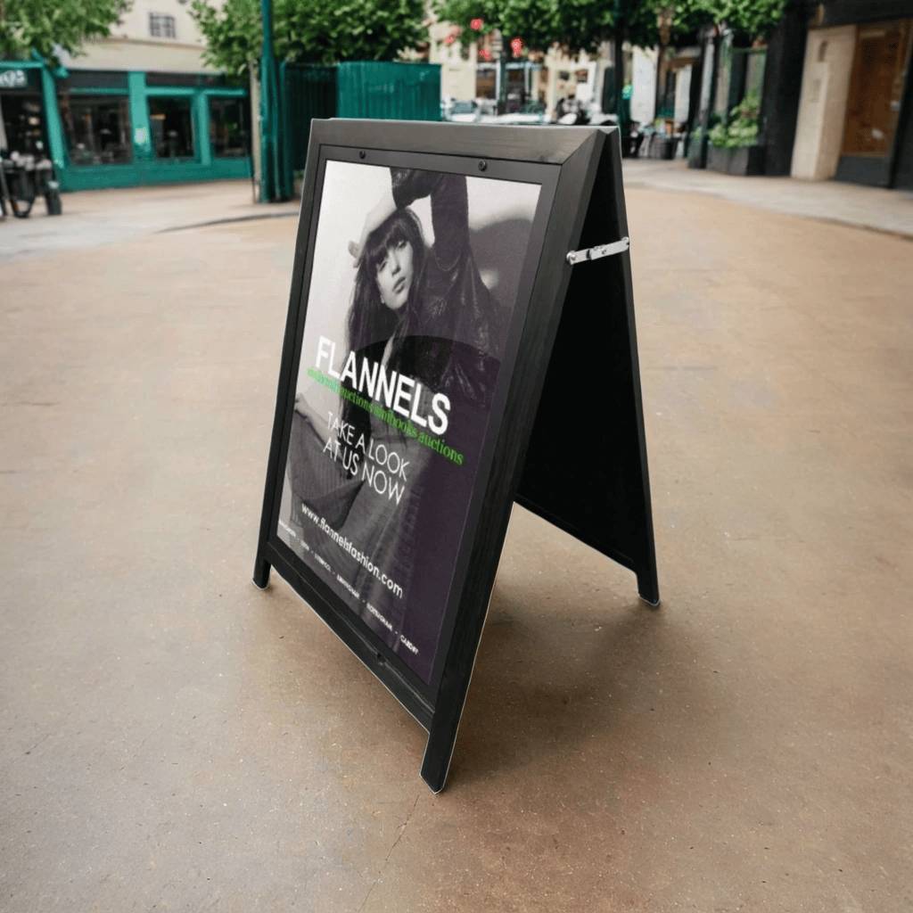 Black wooden A1 poster holder A-board pavement sign, perfect for outdoor advertising and promotional displays.
