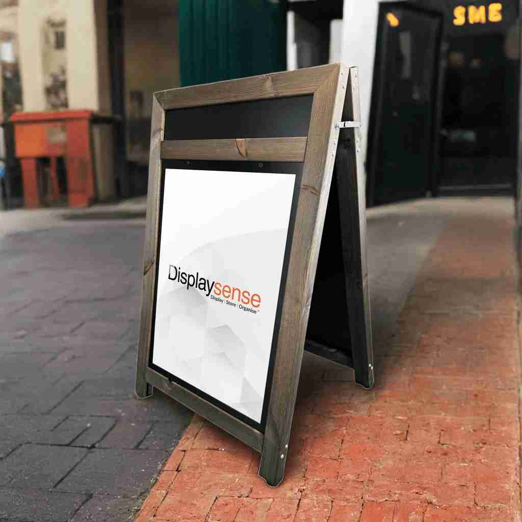 A stylish dark oak wooden A1 A-board pavement sign with a header, perfect for displaying menus, promotions, and branding in cafés, restaurants, and retail spaces.
