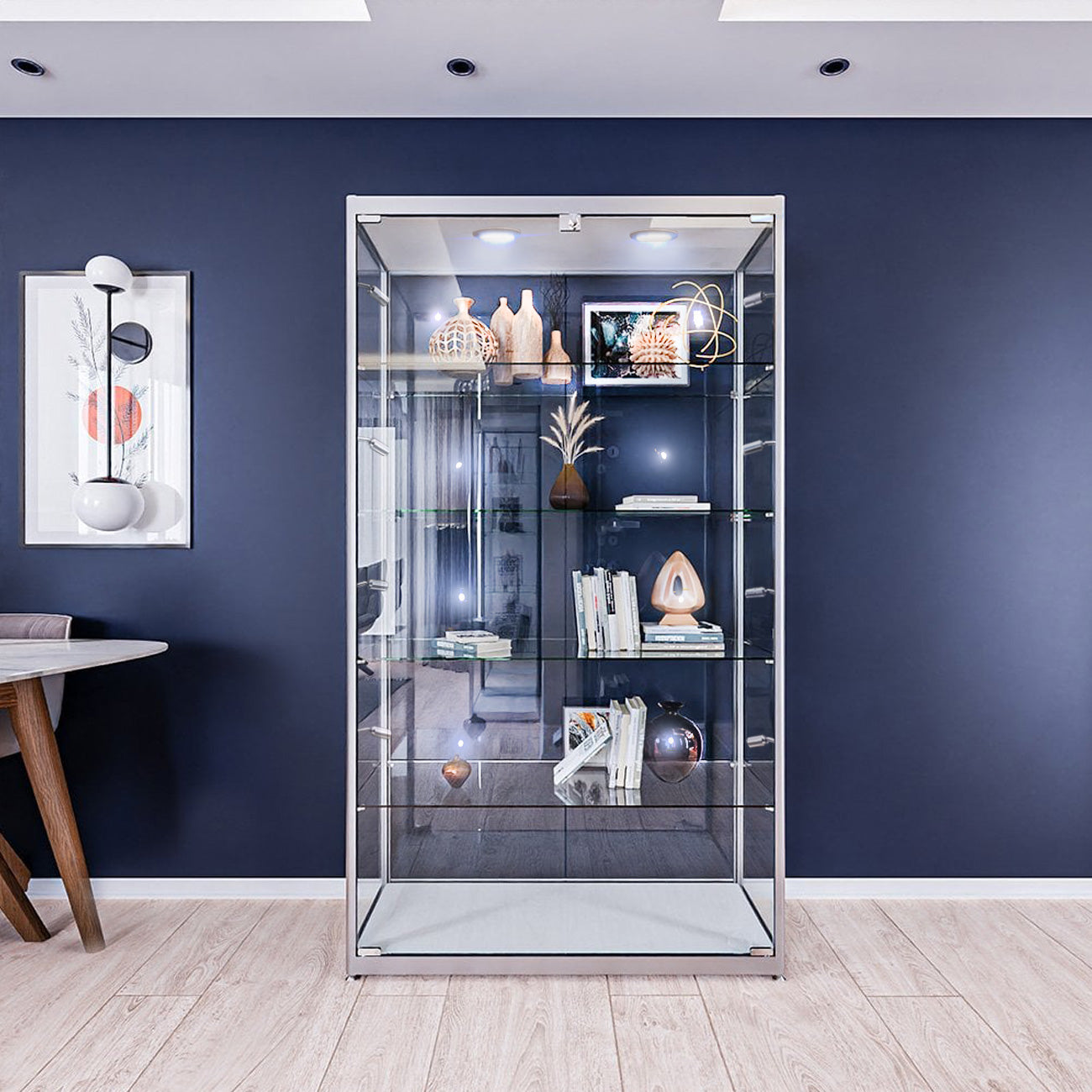 Lockable silver aluminium and glass display cabinet, 1800mm high x 1000mm wide, featuring 4 adjustable shelves and 10 LED lights.