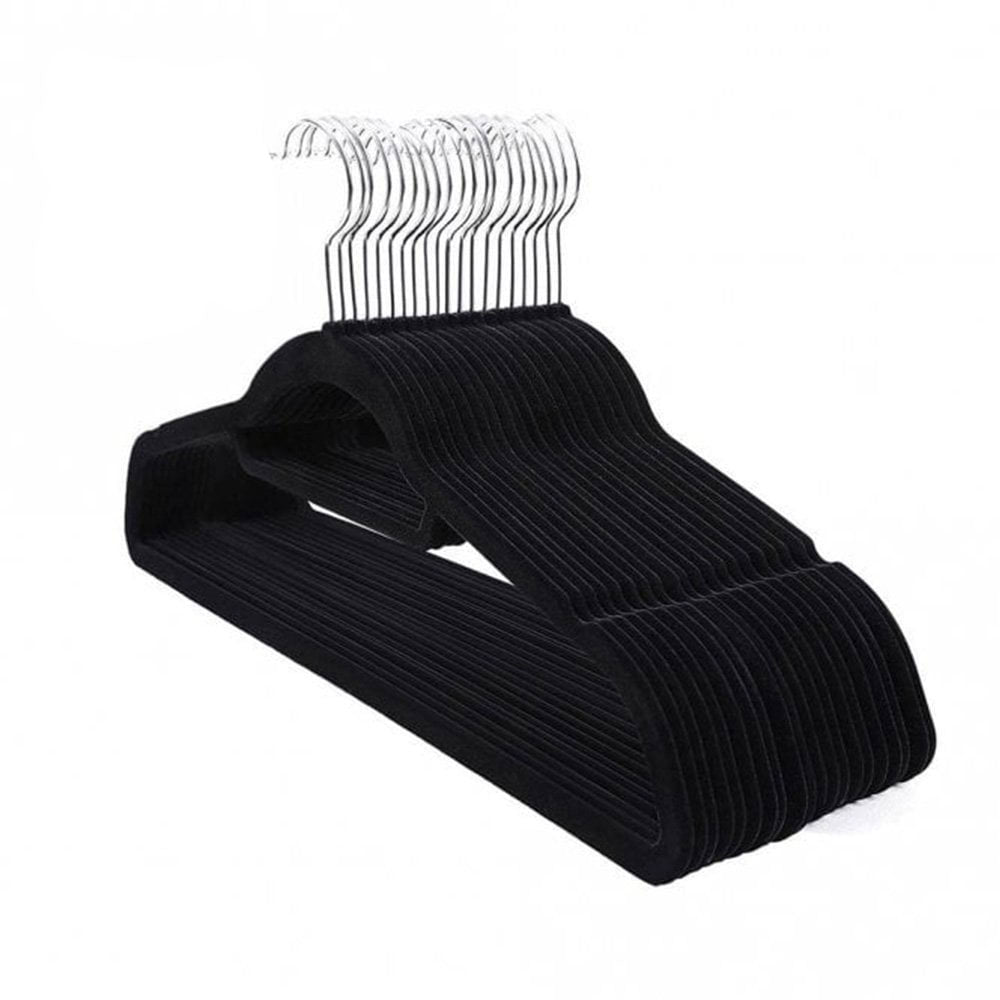 Set of 20 black velvet hangers with a non-slip surface, perfect for delicate and heavy garments.
