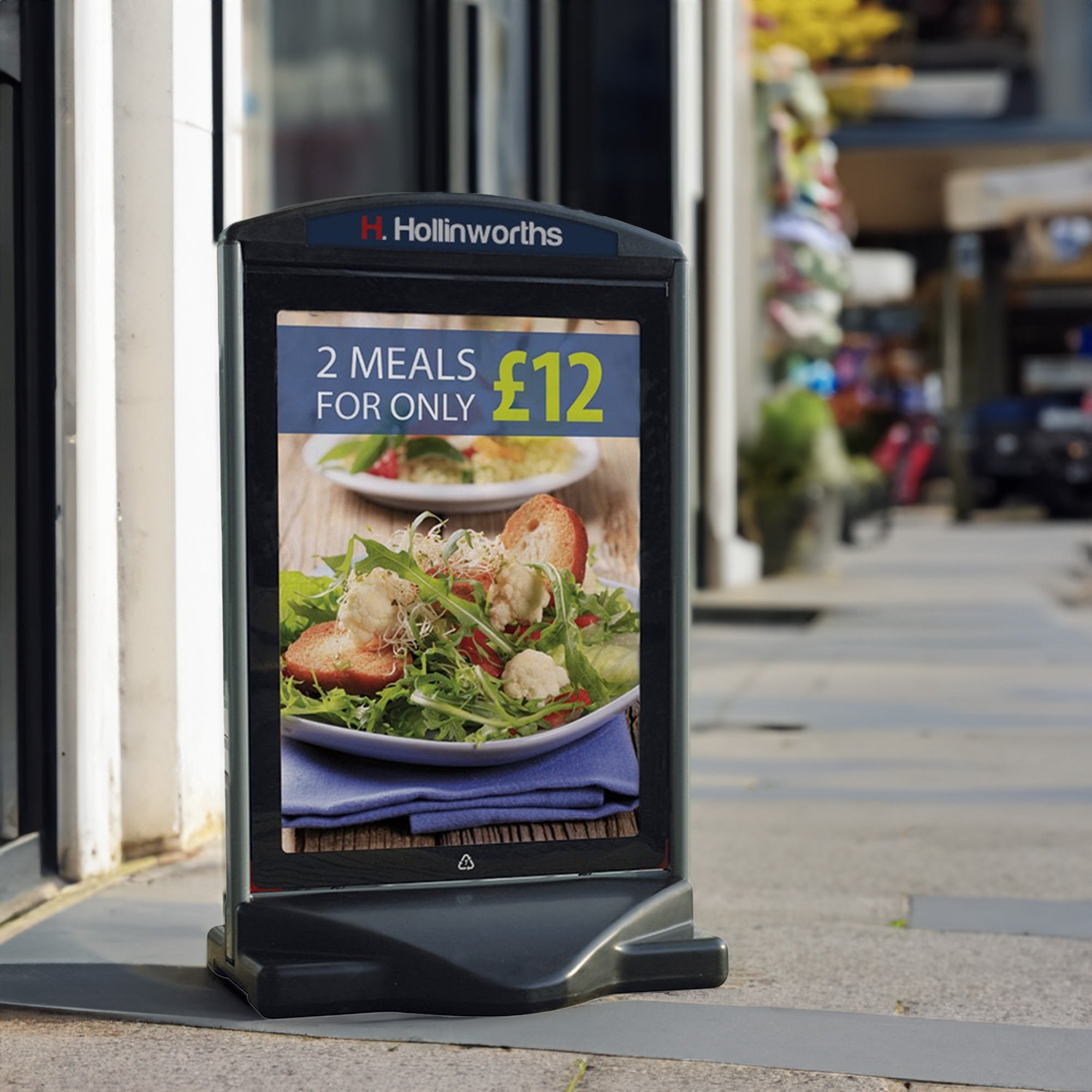 Premium A1 black heavy-duty pavement sign with a sturdy water-filled base, double-sided for maximum visibility.
