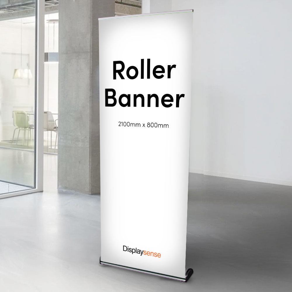 This sleek and durable aluminium roller banner stand features a front-loading mechanism for quick and easy setup, complete with custom printing for 2100mm x 800mm banners, ideal for exhibitions and promotions.
