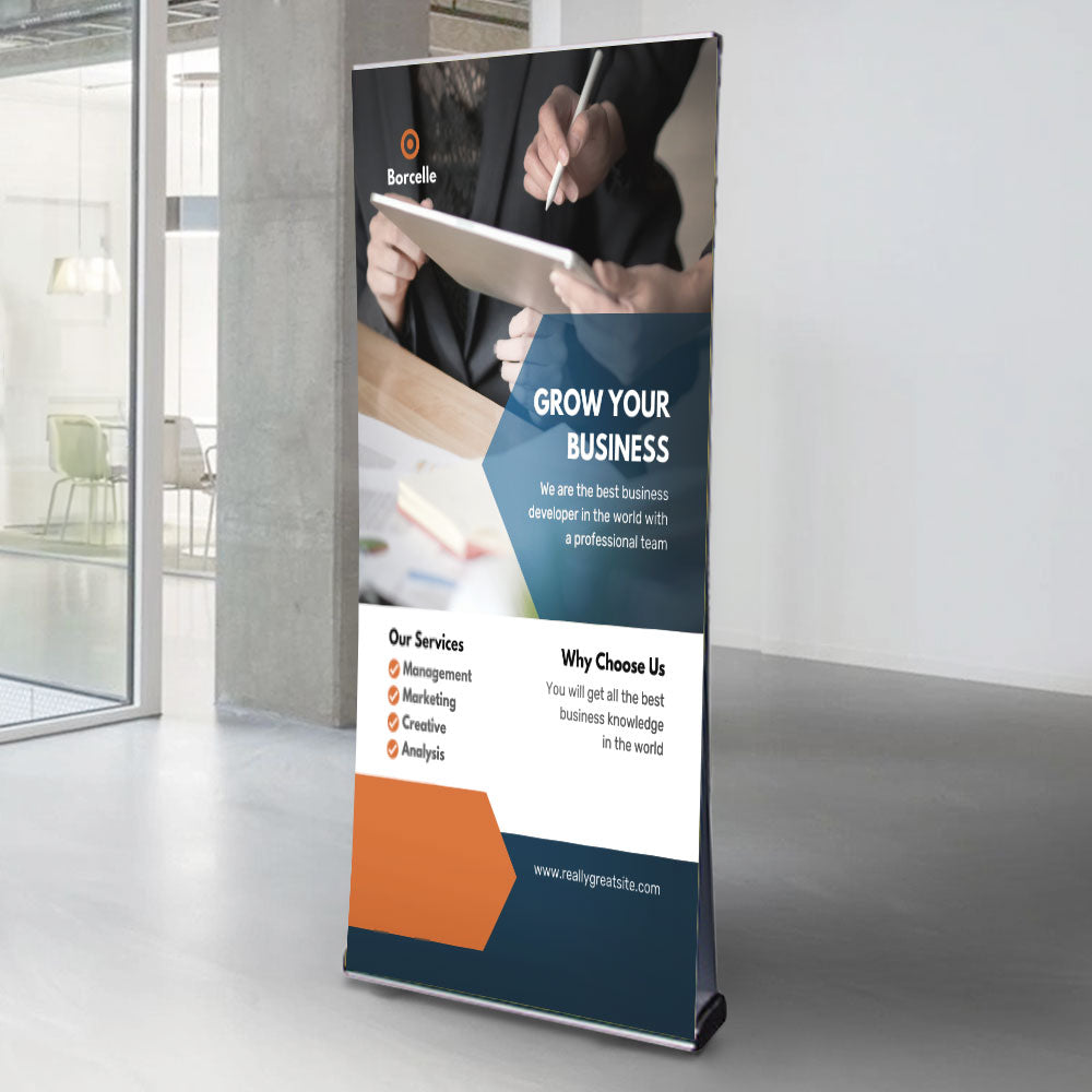 A premium double-sided aluminium front-loading roller banner stand, designed to securely hold 2100mm high x 1000mm wide banners for a professional and high-impact display.
