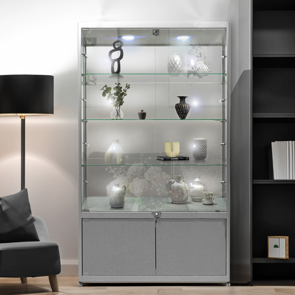 Sleek silver aluminium lockable glass storage display cabinet with three adjustable shelves and ten LED lights, measuring 1800mm high by 1000mm wide.