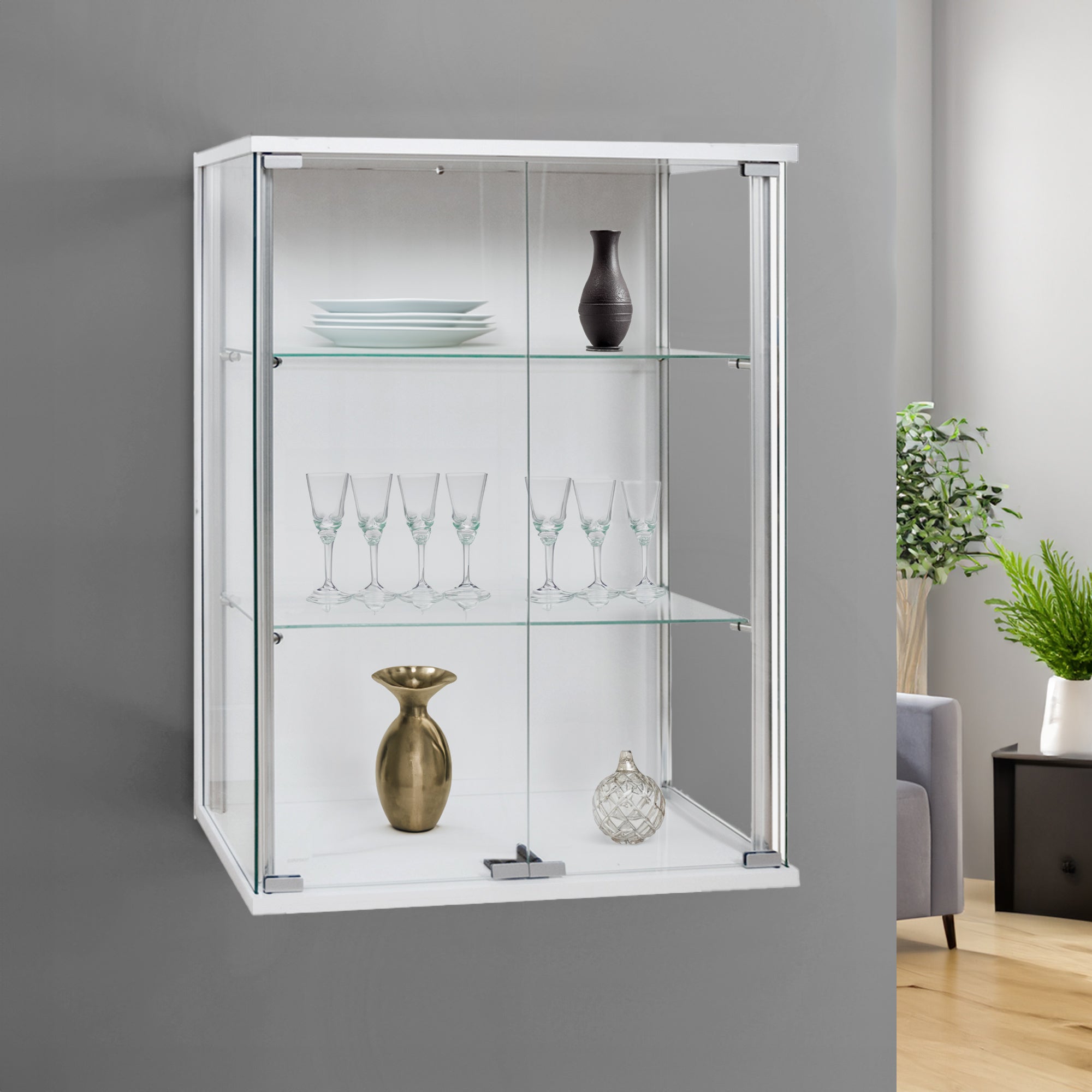 Sleek white wall-mounted display cabinet with double doors and two adjustable shelves, measuring 600mm wide.